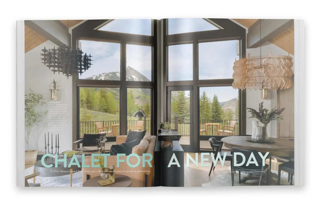 Interior spread of Colorado Homes & Lifestyles magazine featuring a luxury mountain living room in Mount Crested Butte, Colorado, with floor-to-ceiling windows, alpine views, and interior architecture by Freestyle Architects.