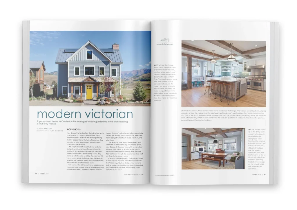 Magazine spread featuring a modern Victorian-style home in Crested Butte with a light blue exterior and custom-designed kitchen interior