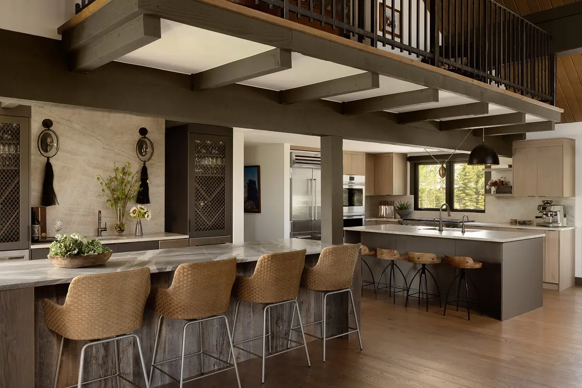 Spacious mountain kitchen renovation with dual islands, natural wood cabinetry, and high-end appliances.